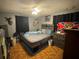 Bright bedroom with ceiling fan and ample closet space at 6297 Harcross Ct, Spring Hill, FL 34606