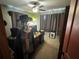 Home office with built-in desk and window light at 6297 Harcross Ct, Spring Hill, FL 34606