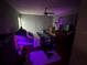 Spacious bedroom with a large bed and TV at 6297 Harcross Ct, Spring Hill, FL 34606