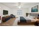 Modern bedroom showcasing stylish decor, including a plush bed and elegant furnishings at 1606 Laughton Pl, Sun City Center, FL 33573