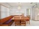 Charming dining area with natural light, tile flooring, and built in bench at 1606 Laughton Pl, Sun City Center, FL 33573