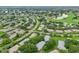 Wide aerial view of the community and surrounding area at 1606 Laughton Pl, Sun City Center, FL 33573