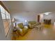 Cozy living room with bright windows, neutral walls, and comfortable seating at 11200 102Nd Ave # 60, Seminole, FL 33778