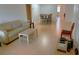 A living room that features hardwood floors and a dining table at 11200 102Nd Ave # 60, Seminole, FL 33778