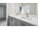Modern bathroom with double sink vanity and quartz countertop at 2909 W Spruce St, Tampa, FL 33607