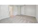 Spacious bedroom featuring neutral carpet, white walls, and ample closet space for comfortable living at 2909 W Spruce St, Tampa, FL 33607
