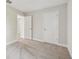 Neutral bedroom with two doors and plush carpeting at 2909 W Spruce St, Tampa, FL 33607