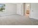 Inviting bedroom with soft carpet, en-suite access and a bright window for natural light at 2909 W Spruce St, Tampa, FL 33607