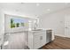 Modern kitchen with an island and stainless steel dishwasher at 2909 W Spruce St, Tampa, FL 33607