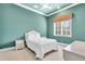 Bright bedroom with double bed, nightstands, and window coverings at 19451 Ganton Ave, Bradenton, FL 34202