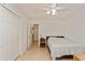 Spacious bedroom with double bed, ceiling fan and ample closet space at 11200 102Nd Ave # 60, Seminole, FL 33778