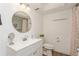Updated bathroom with a white vanity, toilet and shower with grab bars at 11200 102Nd Ave # 60, Seminole, FL 33778