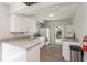 Efficient galley kitchen with granite countertops at 11200 102Nd Ave # 60, Seminole, FL 33778