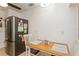 Small dining area adjacent to kitchen, featuring a wood table at 11200 102Nd Ave # 60, Seminole, FL 33778