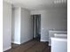 Bright hallway with fresh gray paint, white trim and view into other rooms at 4017 W Fig St, Tampa, FL 33609