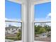 Corner window view showcasing blue skies and neighborhood homes at 4017 W Fig St, Tampa, FL 33609