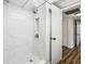 Shower with marble-look tile and a niche at 19029 Us Highway 19 N # 4-5, Clearwater, FL 33764