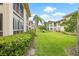 Landscaped grounds with manicured lawns and lush shrubbery at 19029 Us Highway 19 N # 4-5, Clearwater, FL 33764