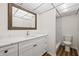 Modern bathroom with white vanity, quartz countertop, and walk-in shower at 19029 Us Highway 19 N # 4-5, Clearwater, FL 33764