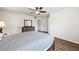 Spacious bedroom with wood-look floors and ceiling fan at 19029 Us Highway 19 N # 4-5, Clearwater, FL 33764