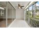 Screened lanai with tile floors and ceiling fan at 19029 Us Highway 19 N # 4-5, Clearwater, FL 33764