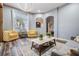Living area with gray walls and a stylish coffee table at 11116 Hoffner Edge Dr, Riverview, FL 33579