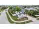 Two-story house with a large driveway and landscaping at 11116 Hoffner Edge Dr, Riverview, FL 33579