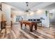 Game room features a pool table and wet bar at 11116 Hoffner Edge Dr, Riverview, FL 33579