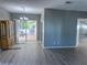 Bright dining room with wood flooring and view of patio at 12034 Stone Crossing Cir, Tampa, FL 33635