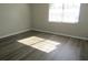 Bedroom featuring a window for natural light and neutral paint at 1306 Idlewood Dr # 53, Sun City Center, FL 33573