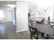 Open-concept layout with kitchen bar leading to dining and living areas at 1306 Idlewood Dr # 53, Sun City Center, FL 33573