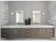 Bathroom boasting double sinks, granite counters, and modern lighting fixtures at 2912 W Santiago St # 1703, Tampa, FL 33629