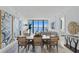 Elegant dining room with water views and modern decor at 2912 W Santiago St # 1703, Tampa, FL 33629