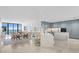 Modern kitchen with marble countertops and blue cabinetry at 2912 W Santiago St # 1703, Tampa, FL 33629