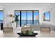 Spacious living room with water views and comfortable seating at 2912 W Santiago St # 1703, Tampa, FL 33629