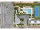 Overhead view of building amenities, including pool and tennis court at 2912 W Santiago St # 1703, Tampa, FL 33629