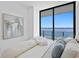 Bright bedroom with a king-size bed and stunning water views at 2912 W Santiago St # 1703, Tampa, FL 33629