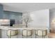 Modern kitchen with light blue cabinets and marble countertops at 2912 W Santiago St # 1703, Tampa, FL 33629