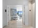 Bright condo entryway with modern art and hardwood floors at 2912 W Santiago St # 1703, Tampa, FL 33629