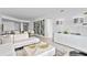 Spacious living room with large windows and modern furniture at 2912 W Santiago St # 1703, Tampa, FL 33629