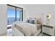 Comfortable bedroom with a queen-size bed and balcony access at 2912 W Santiago St # 1703, Tampa, FL 33629
