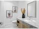 Contemporary powder room with sleek vanity and marble countertop at 2912 W Santiago St # 903, Tampa, FL 33629