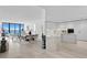 Modern kitchen with white cabinets, marble counters, and breakfast bar at 2912 W Santiago St # 903, Tampa, FL 33629