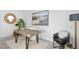 Home office with a modern desk, comfortable chair, and inspiring art at 2912 W Santiago St # 903, Tampa, FL 33629