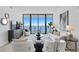 Spacious living room featuring water views and comfortable seating at 2912 W Santiago St # 903, Tampa, FL 33629
