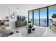 Bright living room with water view and comfy seating at 2912 W Santiago St # 903, Tampa, FL 33629