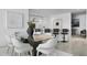 Modern dining area with glass table and comfortable seating at 2912 W Santiago St # 903, Tampa, FL 33629