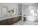 Spa-like bathroom with double vanity and soaking tub at 2912 W Santiago St # 903, Tampa, FL 33629