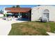 Relaxing patio area with seating and grill at 7131 El Dewitt St, Zephyrhills, FL 33541