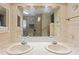 Bathroom with dual sinks and a large mirror at 7131 El Dewitt St, Zephyrhills, FL 33541